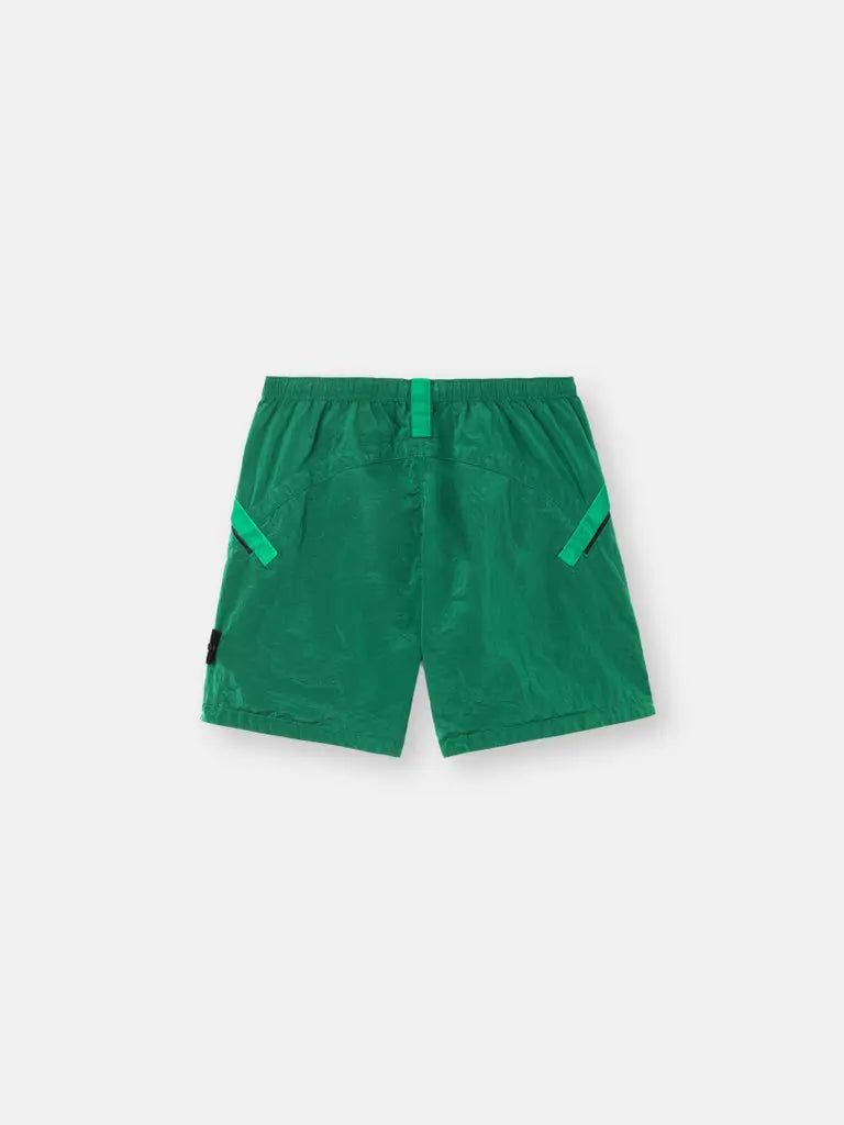 Short confectionné dans le tissu Nylon Metal de Stone Island - CALVERO