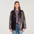 Blouson oversize en cuir à studs - CALVERO