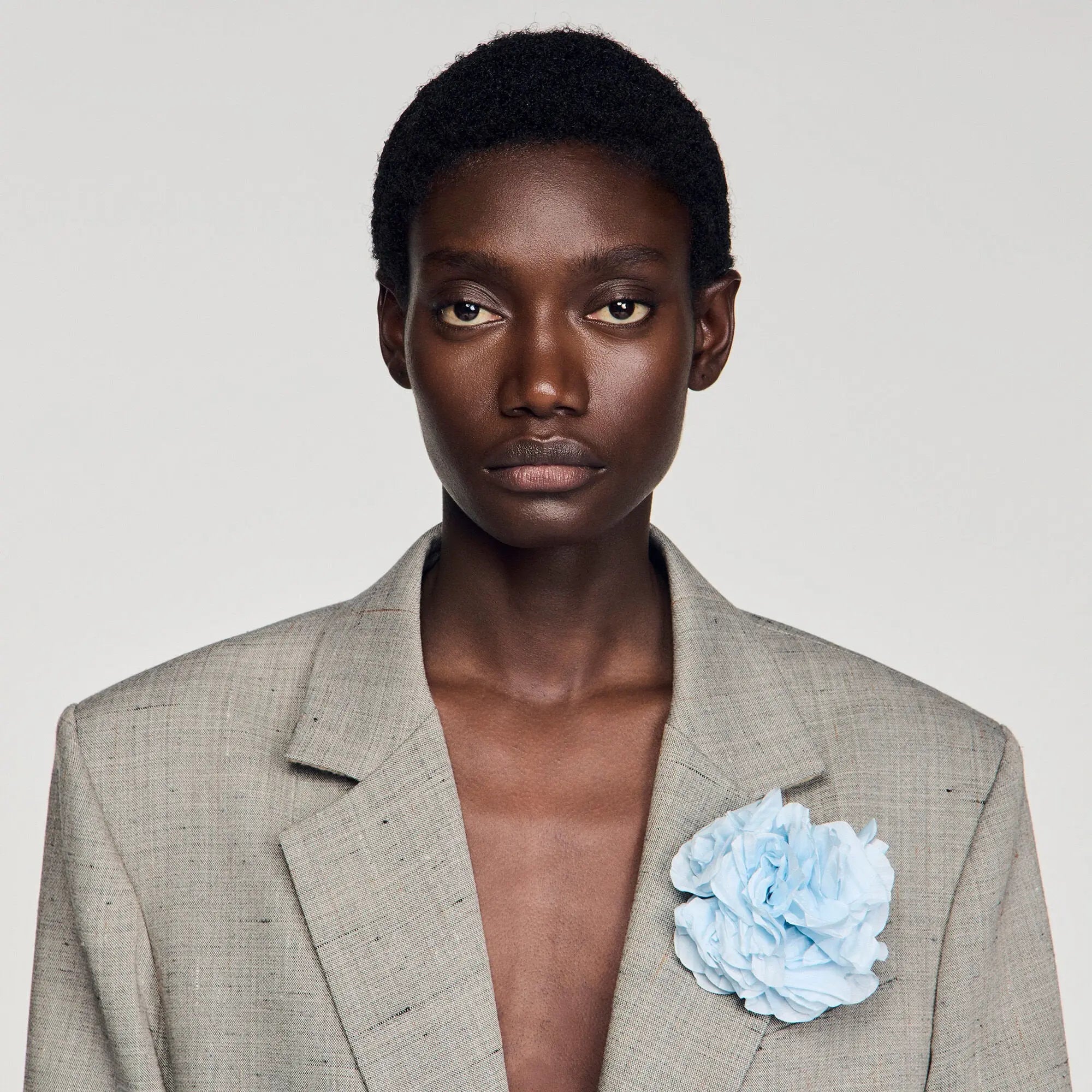 Veste en laine à carreaux et broche - CALVERO