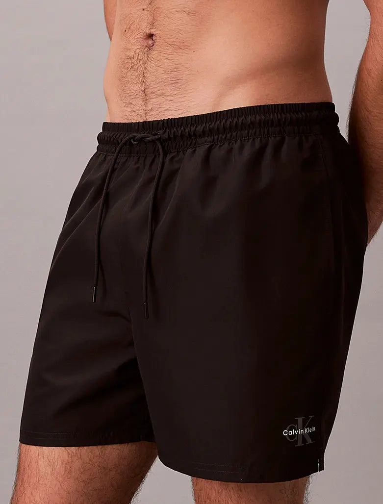 Short de bain mi-long avec cordon de serrage - CK Monogram - CALVERO