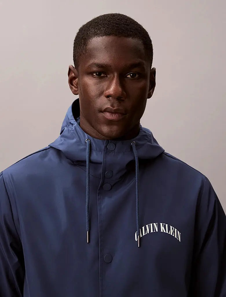 Veste coach à capuche avec logo graphique Calvin Klein