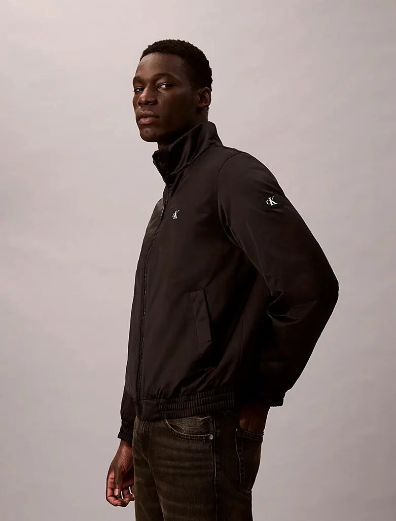 Veste matelassée à fermeture éclair et col cheminée Calvin Klein
