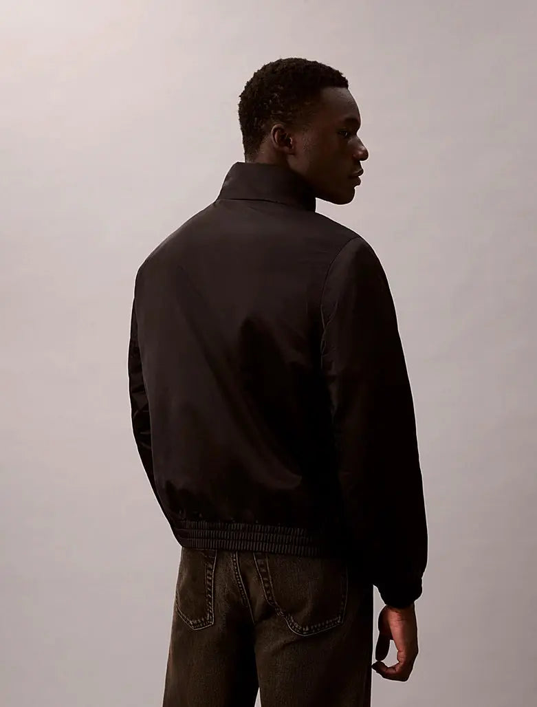 Veste matelassée à fermeture éclair et col cheminée Calvin Klein