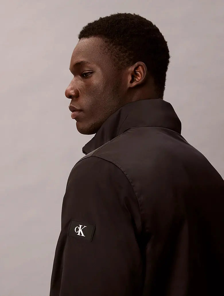 Veste matelassée à fermeture éclair et col cheminée Calvin Klein