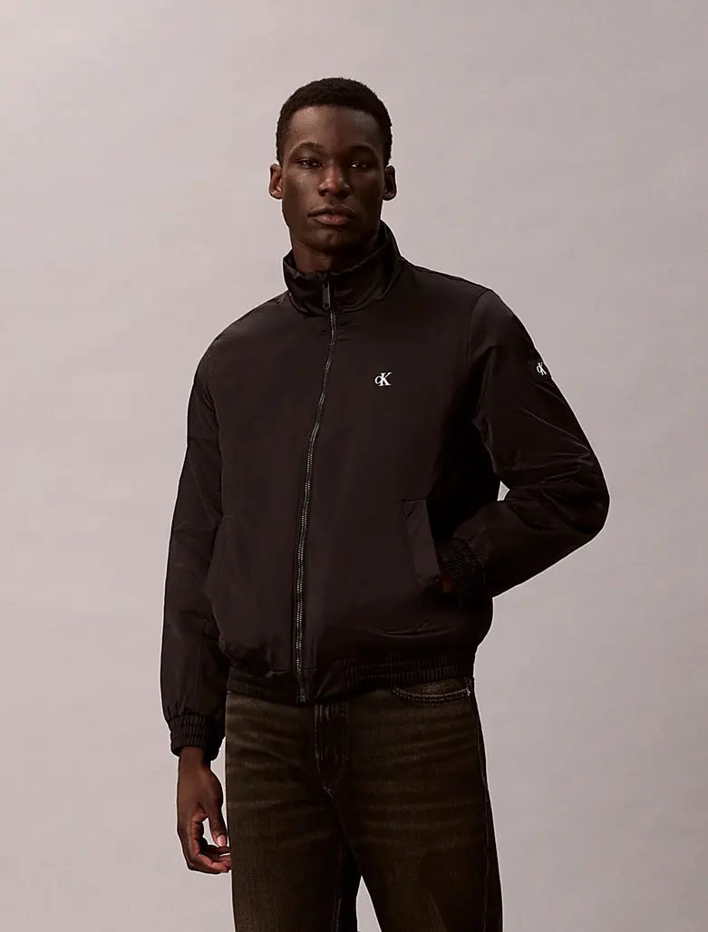 Veste matelassée à fermeture éclair et col cheminée Calvin Klein
